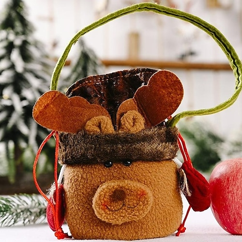 Christmas elk with apple bag in hand